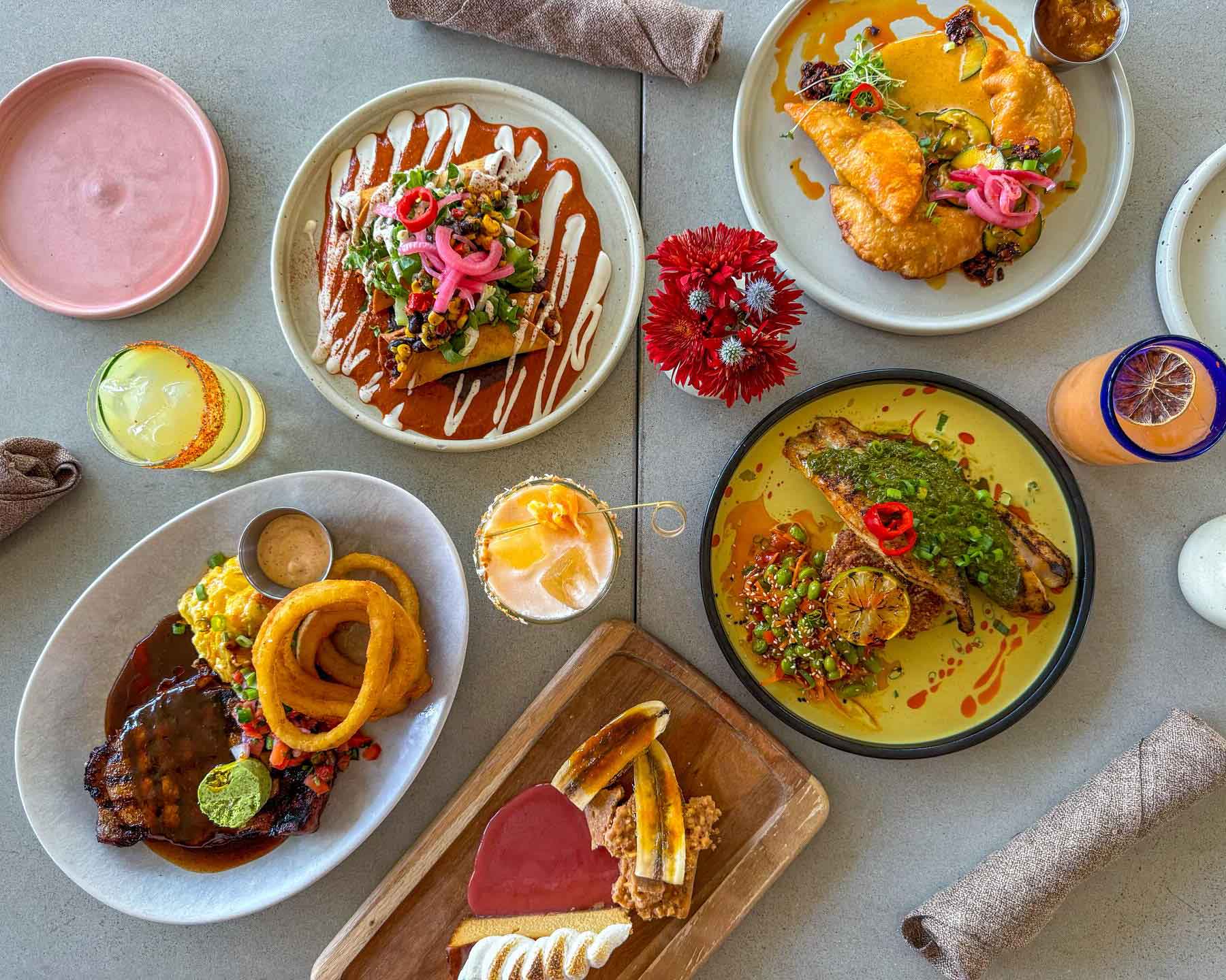 Chef Features of Teriyaki Chicken Empanadas, Chimichurri Snapper, Wood-Grilled Ribeye, Vegan Flautas, and Banana Custard Pie at FRIDA southwest